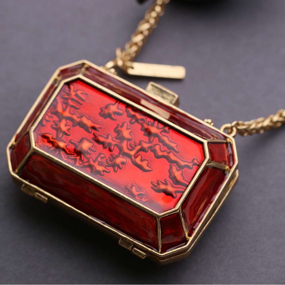 Uterque mini red metal purse with gold chain